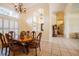 Traditional dining room filled with natural light, perfect for Gathering gatherings and entertaining at 645 Whisper Woods Dr, Lakeland, FL 33813
