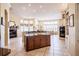 Spacious kitchen with central island cooktop, lots of light, and modern appliances at 645 Whisper Woods Dr, Lakeland, FL 33813