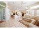 Expansive living area boasts an open layout, connecting the kitchen, fireplace and dining area at 645 Whisper Woods Dr, Lakeland, FL 33813