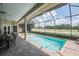 Beautiful pool and spa with screened enclosure, perfect for outdoor living and entertaining guests at 645 Whisper Woods Dr, Lakeland, FL 33813