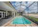 Gorgeous pool and spa with screened enclosure overlooking the golf course, ideal for resort-style living at 645 Whisper Woods Dr, Lakeland, FL 33813