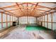 Spacious building interior with high ceilings and wood supports, offering ample storage at 6527 Fernwood Dr, Lakeland, FL 33810