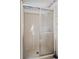 Bathroom featuring a shower with sliding doors, offering a clean and functional design at 6731 Canterbury Ne Dr, Winter Haven, FL 33881