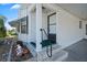 Welcoming entrance with steps, handrail, and space for decor at 6731 Canterbury Ne Dr, Winter Haven, FL 33881