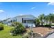 Charming home with well-maintained landscaping and a mailbox near the front at 6731 Canterbury Ne Dr, Winter Haven, FL 33881