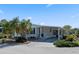 Lovely home with a covered carport and well-kept landscaping at 6731 Canterbury Ne Dr, Winter Haven, FL 33881