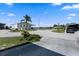 Picturesque street view with well-maintained homes and mature landscaping at 6731 Canterbury Ne Dr, Winter Haven, FL 33881