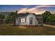 Charming single-story home featuring a welcoming front porch, fresh paint, and a well-manicured lawn at 725 Avenue B Sw, Winter Haven, FL 33880