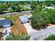 Aerial view of home showcasing the property's layout and landscaping with mature tree coverage at 790 Chelsea Way, Lake Wales, FL 33853