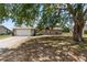 Charming single-story brick home featuring a two-car garage and well-maintained lawn at 790 Chelsea Way, Lake Wales, FL 33853