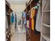 Spacious walk-in closet with ample storage, custom shelving, and full length mirror, offering plenty of space at 790 Chelsea Way, Lake Wales, FL 33853