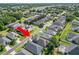 Beautiful aerial view of a residential neighborhood with well-maintained homes and lush green landscaping at 843 Christina Chase Dr, Lakeland, FL 33813