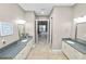 Large ensuite bathroom with dual sinks and granite countertops at 843 Christina Chase Dr, Lakeland, FL 33813
