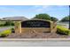 Christina Chase community entrance sign with manicured landscaping and clear blue sky at 843 Christina Chase Dr, Lakeland, FL 33813