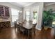Dining area features a large window, wine rack and a view to the backyard at 843 Christina Chase Dr, Lakeland, FL 33813