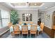 This spacious dining room boasts ample natural light, with stylish décor, and room to gather with friends and Gathering at 843 Christina Chase Dr, Lakeland, FL 33813