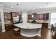 Well-equipped kitchen with granite countertops, stainless steel appliances, and wine rack at 843 Christina Chase Dr, Lakeland, FL 33813