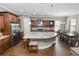 Spacious kitchen with granite counters, stainless steel appliances, and hardwood floors at 843 Christina Chase Dr, Lakeland, FL 33813