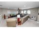 Spacious living room features recessed lighting, ceiling fan, and exercise equipment at 843 Christina Chase Dr, Lakeland, FL 33813