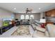 The upper level features a cozy living area with media center, fitness equipment, and a wet bar with cherry cabinets at 843 Christina Chase Dr, Lakeland, FL 33813