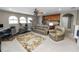 The upper level is set up as a spacious living area with a wet bar and fitness equipment at 843 Christina Chase Dr, Lakeland, FL 33813