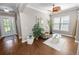Inviting living room with stylish décor, hardwood floors, and a cozy seating area by the bright window at 843 Christina Chase Dr, Lakeland, FL 33813