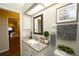 Bright bathroom offers a granite countertop, a framed mirror, and fresh decor and fixtures at 8760 Plantation Ridge Blvd, Lakeland, FL 33809