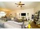 Comfortable living space with open layout, seamlessly connecting the dining area and living spaces at 8760 Plantation Ridge Blvd, Lakeland, FL 33809