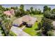 Beautiful aerial view of a landscaped house on a large lot, with its circular driveway and manicured lawn at 9093 S Bay Dr, Haines City, FL 33844