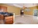 Bright kitchen with tile flooring and view to another room at 9093 S Bay Dr, Haines City, FL 33844
