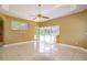 Bright living room with access to the pool via sliding glass doors at 9093 S Bay Dr, Haines City, FL 33844