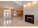 Bright living room featuring fireplace and front entryway at 9093 S Bay Dr, Haines City, FL 33844