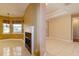 Bright living room featuring fireplace and view to entry and other rooms at 9093 S Bay Dr, Haines City, FL 33844