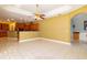 Open living area with view to the kitchen at 9093 S Bay Dr, Haines City, FL 33844