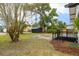 Spacious backyard with a shed and deck, perfect for outdoor activities at 911 S Missouri Ave, Lakeland, FL 33803