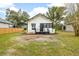 The home features a neat, welcoming entrance and porch at 911 S Missouri Ave, Lakeland, FL 33803