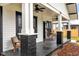Spacious porch with comfortable seating, brick accents, and an inviting atmosphere for relaxing at 911 S Missouri Ave, Lakeland, FL 33803