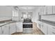 Kitchen with modern stainless-steel appliances at 911 S Missouri Ave, Lakeland, FL 33803