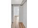 Walk-in closet with ample storage space and wood-look flooring at 911 S Missouri Ave, Lakeland, FL 33803