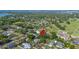 Aerial view of a home near a golf course, showcasing its desirable location and lush surroundings at 916 Woodward St, Lakeland, FL 33803