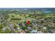 Aerial view of property nearby golf course, lakes and tennis courts at 916 Woodward St, Lakeland, FL 33803