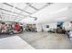 Spacious garage for parking and storage, featuring high ceilings and ample lighting at 916 Woodward St, Lakeland, FL 33803