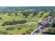 Aerial of Golf Course with lush green grass and a club house at 916 Woodward St, Lakeland, FL 33803