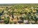 Aerial view shows this home nestled in a quiet and scenic wooded neighborhood at 960 Lila St, Bartow, FL 33830