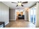 Versatile bonus room with tile floors, ceiling fan and sliding doors that provide easy access to outdoor spaces at 960 Lila St, Bartow, FL 33830