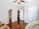Sitting room features hardwood floors, tall decorative clock, and decorative seating at 120 Grove Branch Rd, Winter Haven, FL 33880