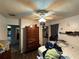 Bright bedroom featuring a ceiling fan and large closet for ample storage at 1208 Lowry Ave, Haines City, FL 33844