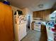 Well-lit kitchen featuring wooden cabinets, modern appliances, and ample counter space at 1208 Lowry Ave, Haines City, FL 33844