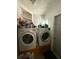 Functional laundry room features a washer and dryer at 1208 Lowry Ave, Haines City, FL 33844