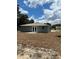 Rear exterior view showcasing the home's design and outdoor space at 1329 Tom Watson Rd, Lakeland, FL 33801